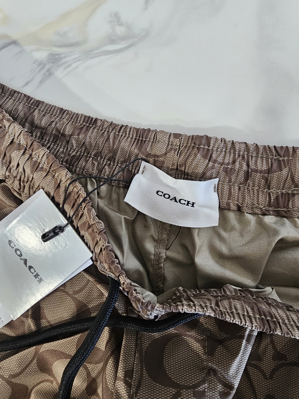 Coach Men’s Signature Swim Trunks — Tan Monogram - Picture 5 of 7